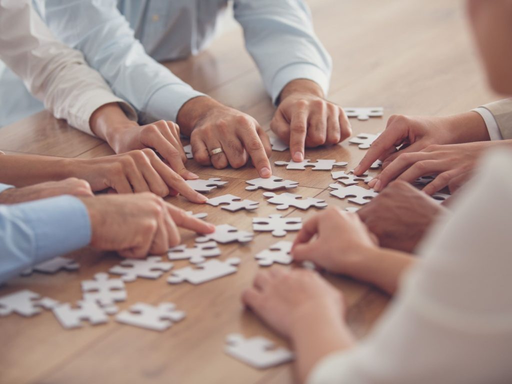 hands with puzzle pieces