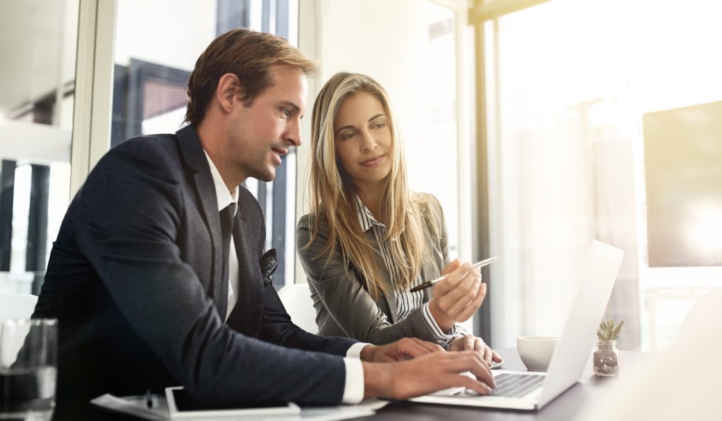 Shot of a two executives working together in an office