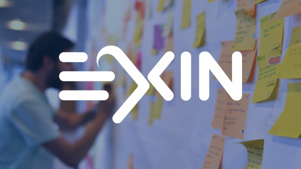 EXIN logo over a person working on a Kanban board (blurred background).